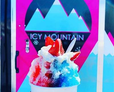 Cup of Shaved Ice in front of Icy Mountain